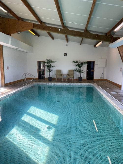 The heated swimming pool at Libbear Barton